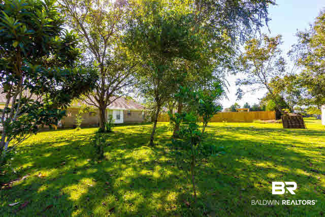 21675 Broad Street Silverhill, AL 36576 - Photo 25 of 31 Shaded Backyard