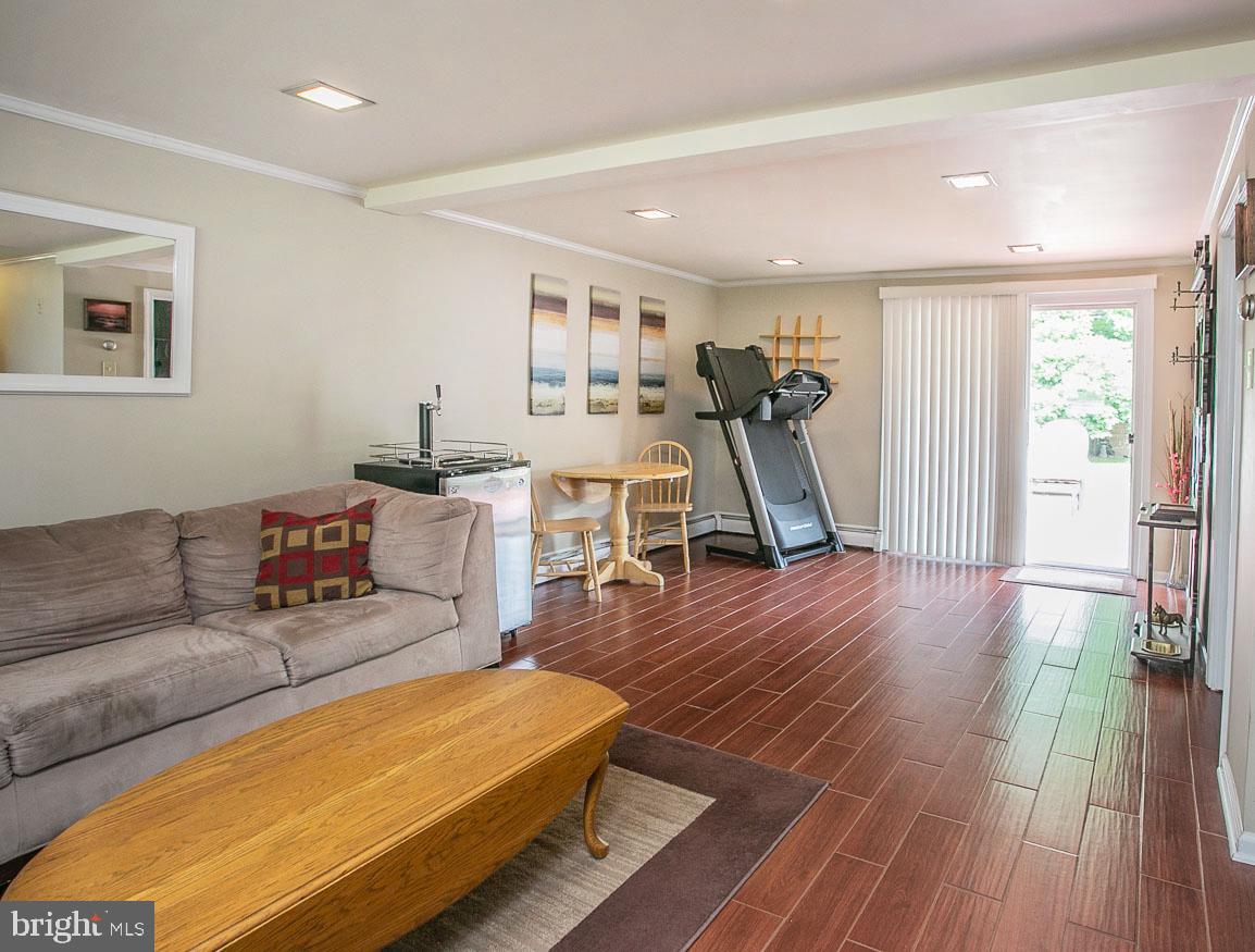 107 Level Road Collegeville, PA 19426 - Photo 24 of 39 Recreation room view of sliders to rear patio