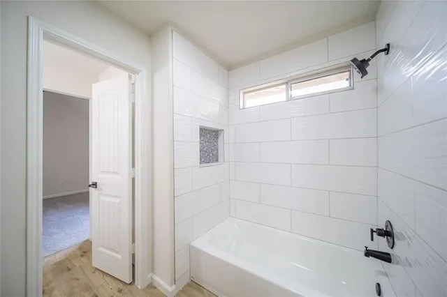 a bathroom with a bathtub