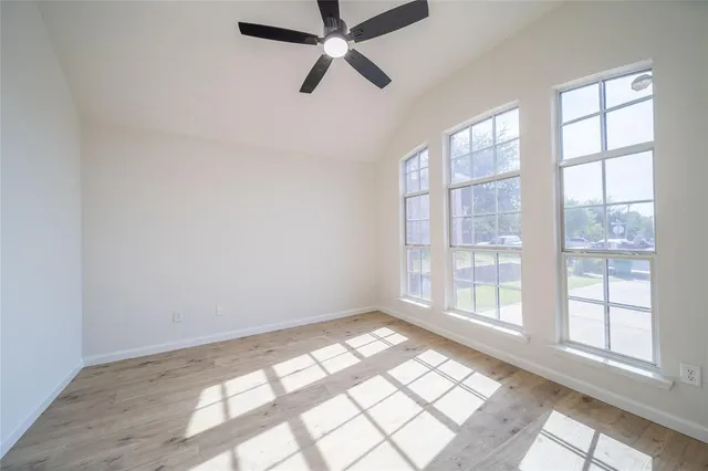 a view of an empty room and window