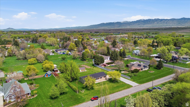 45 West 100 South Mendon, UT 84325 - Photo 52 of 64 Aerial view of residential area featuring a mountainous background