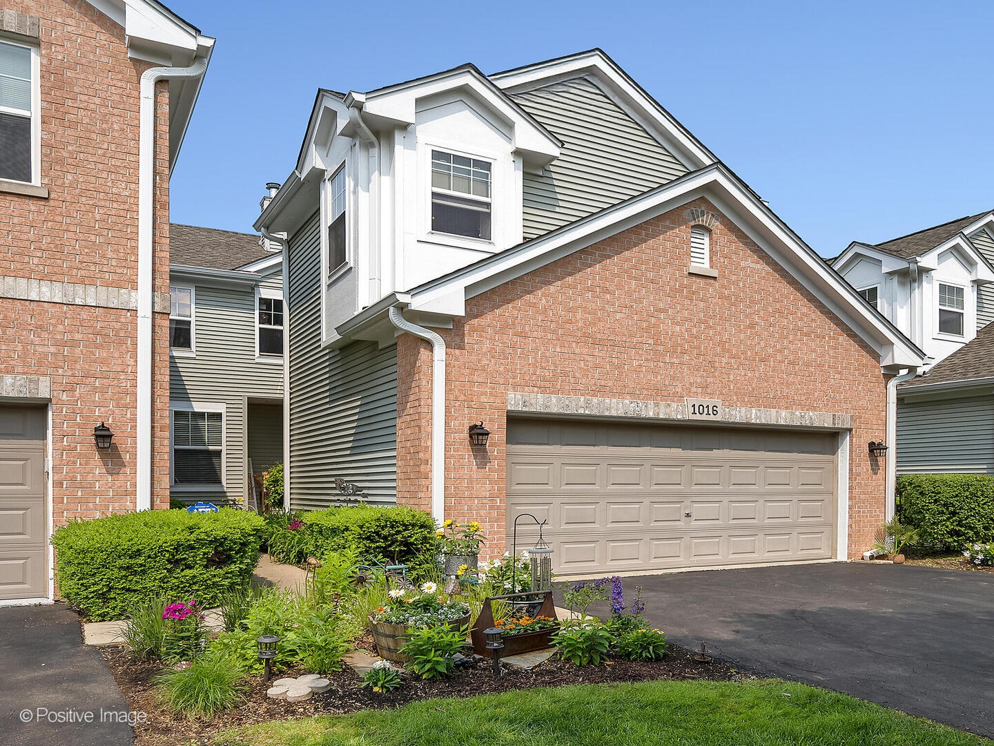 1016 Hummingbird Way Bartlett, IL 60103 - Photo 1 of 41 a view of a white house next to a yard