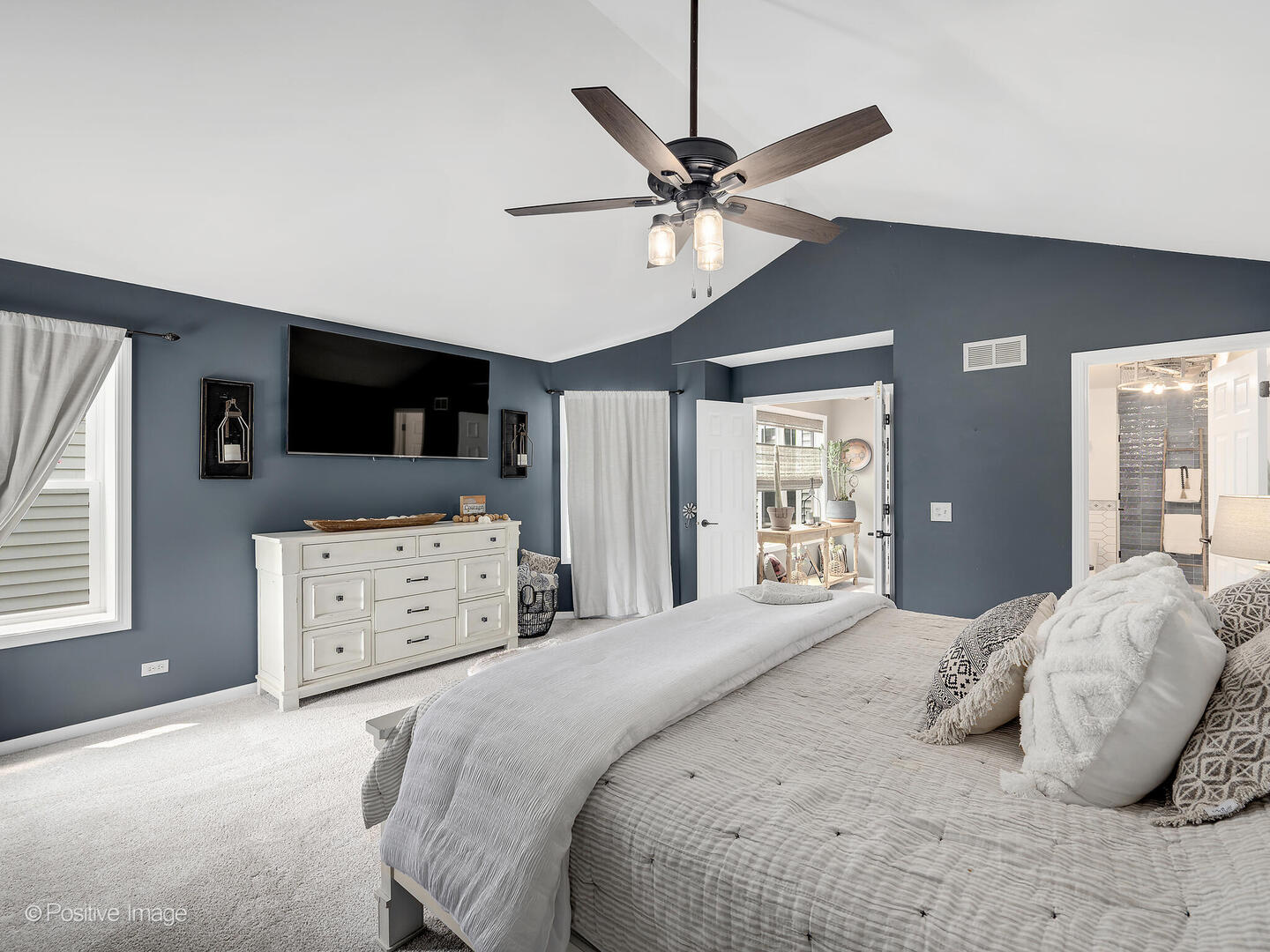1016 Hummingbird Way Bartlett, IL 60103 - Photo 23 of 41 a bedroom with a large bed and a window