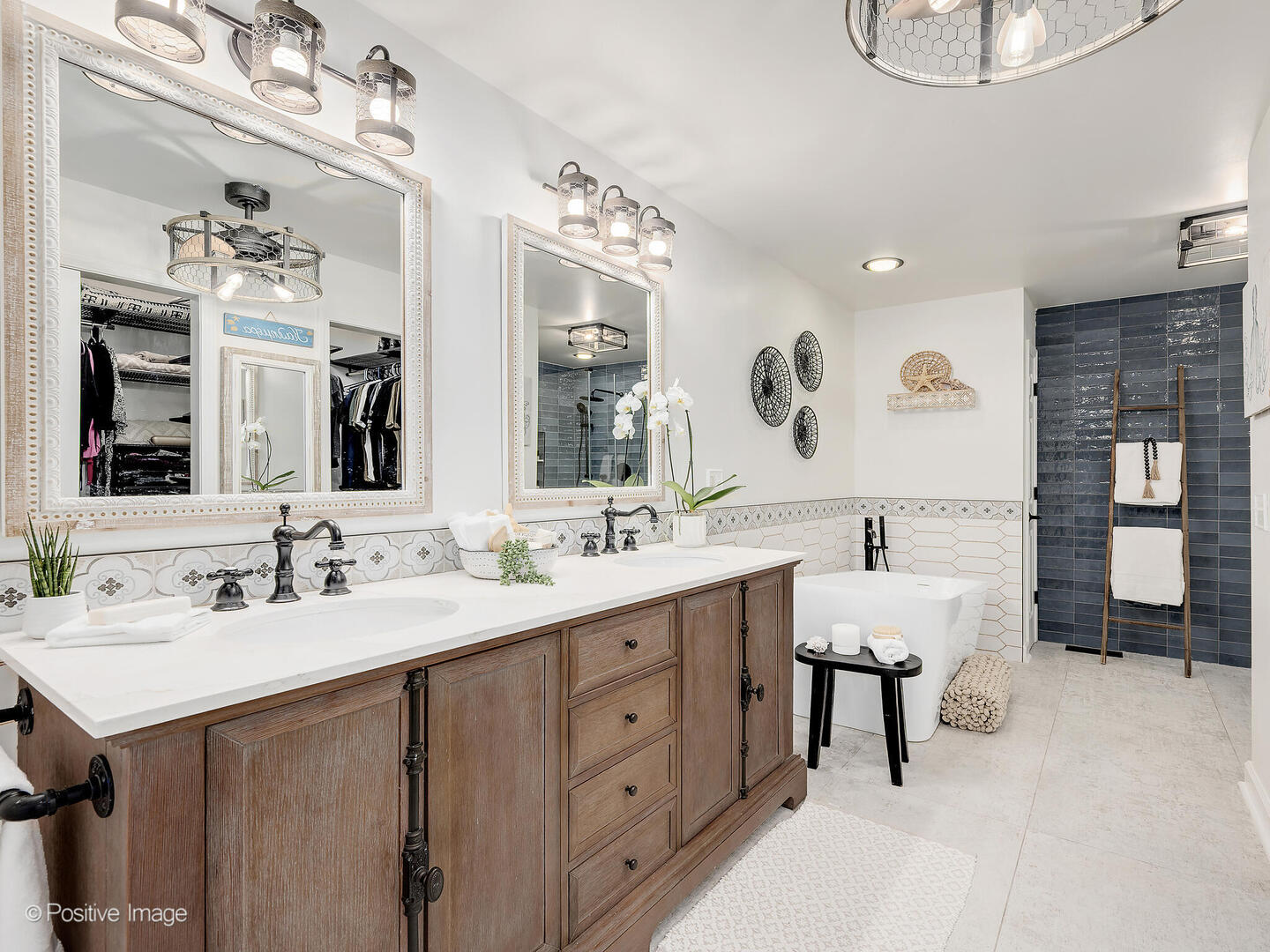 1016 Hummingbird Way Bartlett, IL 60103 - Photo 24 of 41 a spacious bathroom with a double vanity sink double and a mirror