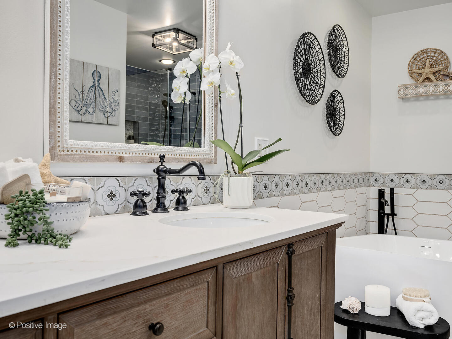 1016 Hummingbird Way Bartlett, IL 60103 - Photo 25 of 41 a bathroom with a sink and a mirror