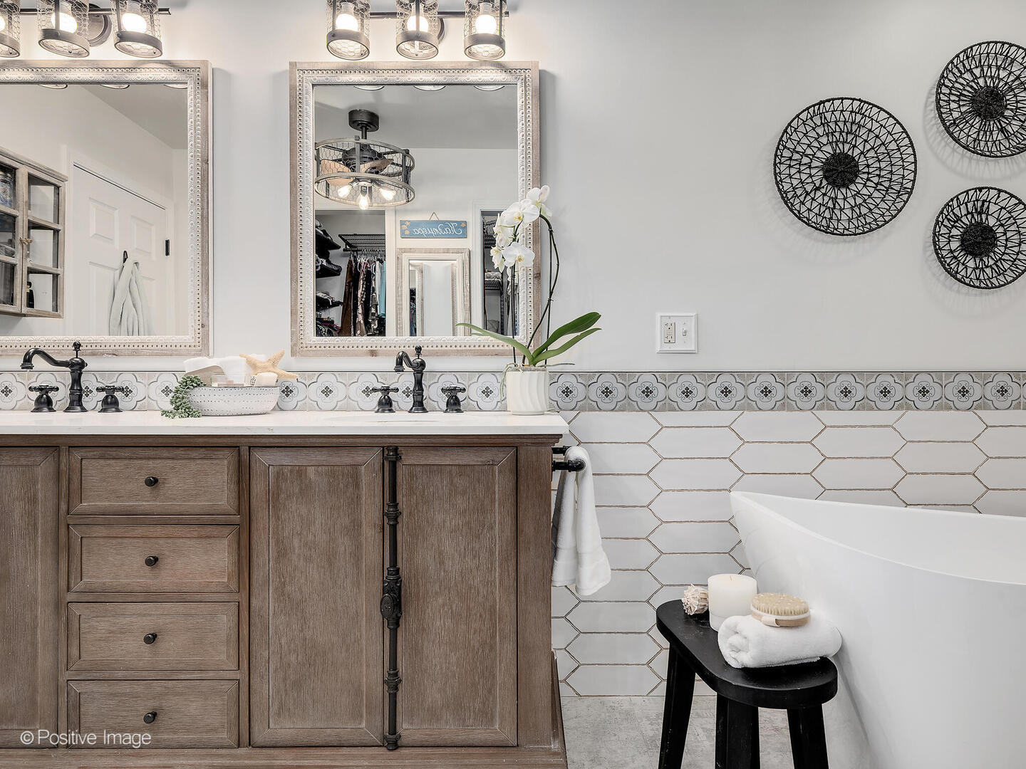1016 Hummingbird Way Bartlett, IL 60103 - Photo 26 of 41 a bathroom with a sink and a mirror