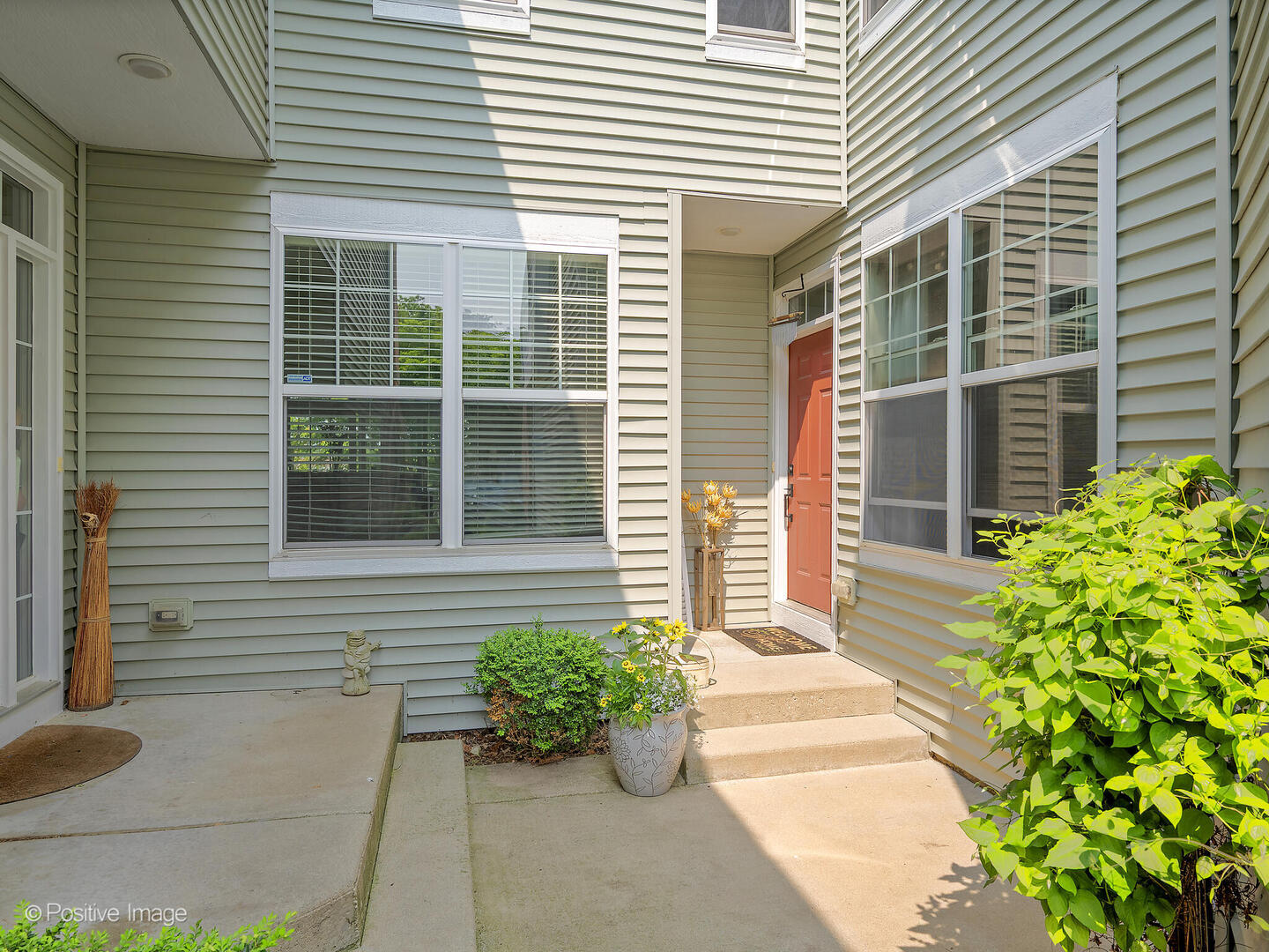 1016 Hummingbird Way Bartlett, IL 60103 - Photo 3 of 41 a view of a house with potted plants