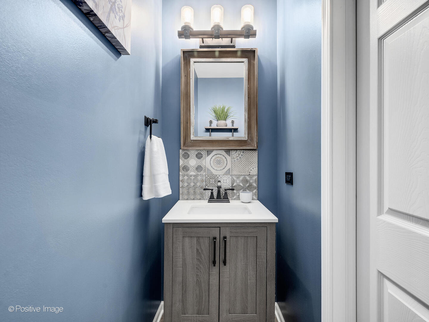 1016 Hummingbird Way Bartlett, IL 60103 - Photo 8 of 41 a bathroom with a sink and a mirror