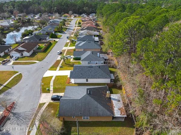a view of swimming pool with chairs