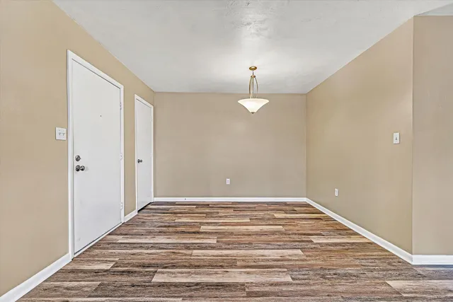 a view of a room with bathroom and shower