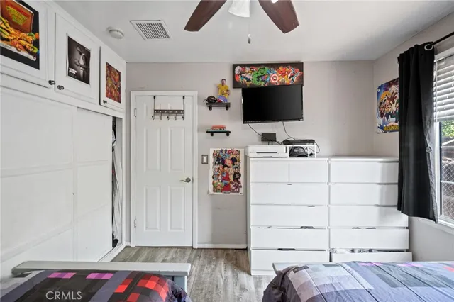 a view of a bedroom with baby toys