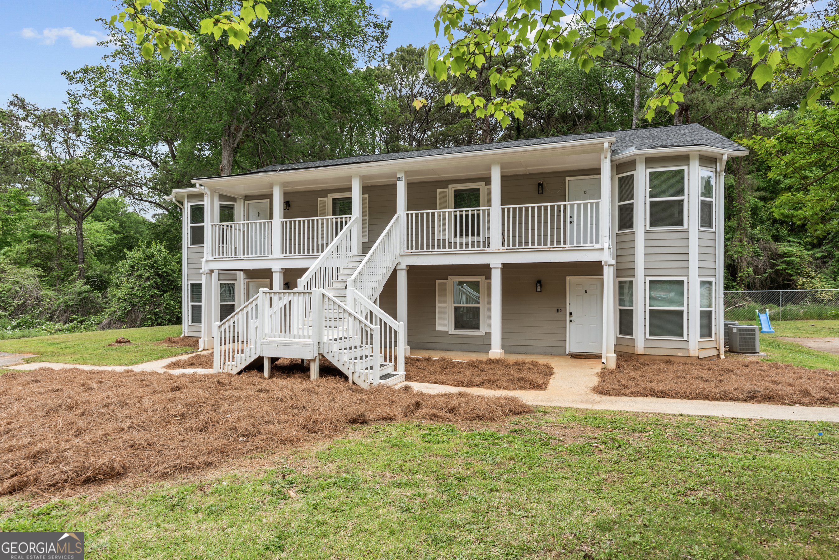 140 Cumberland Court Athens, GA 30607 - Photo 2 of 19 front view of a house with a yard