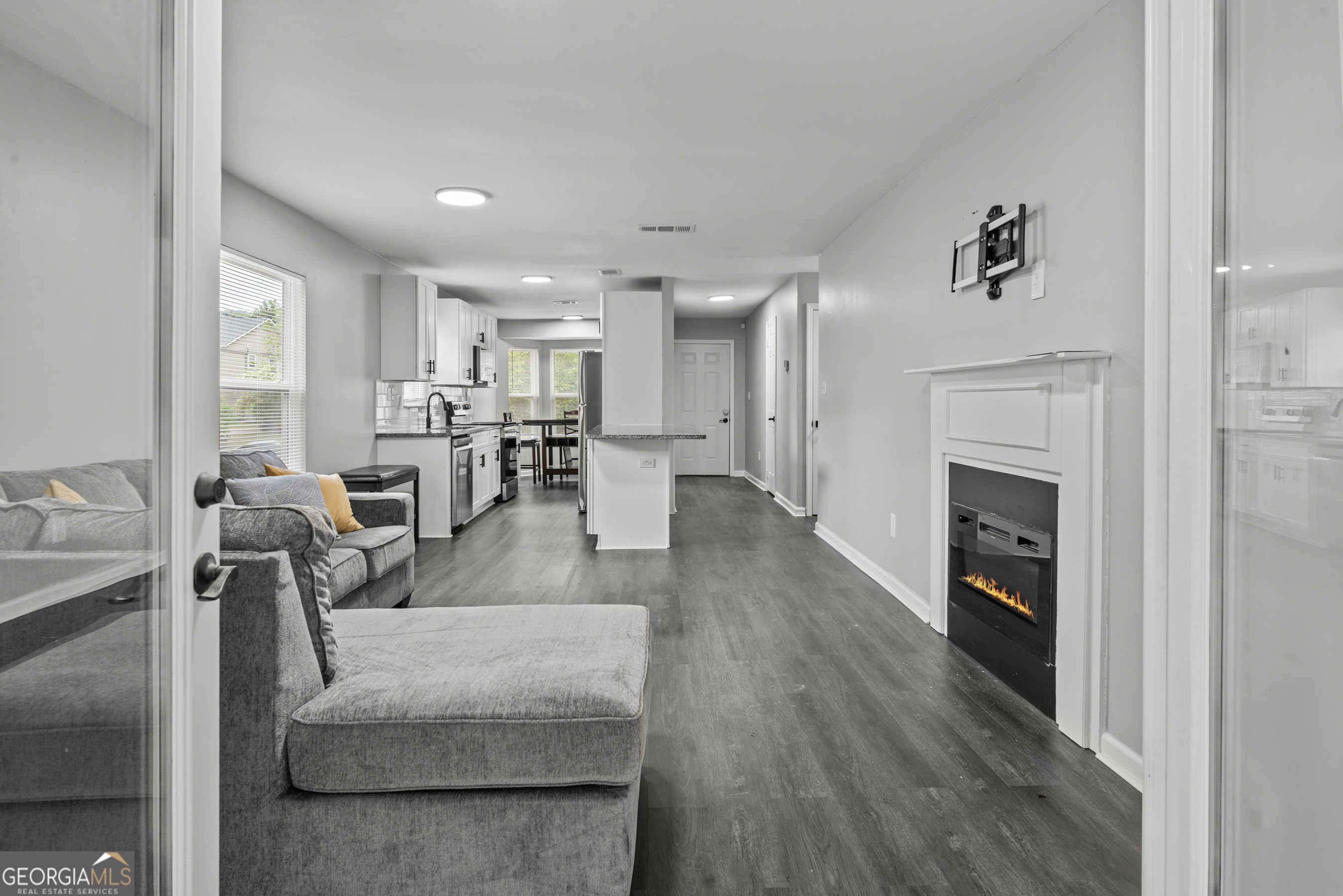 140 Cumberland Court Athens, GA 30607 - Photo 9 of 19 a living room with furniture and a fireplace