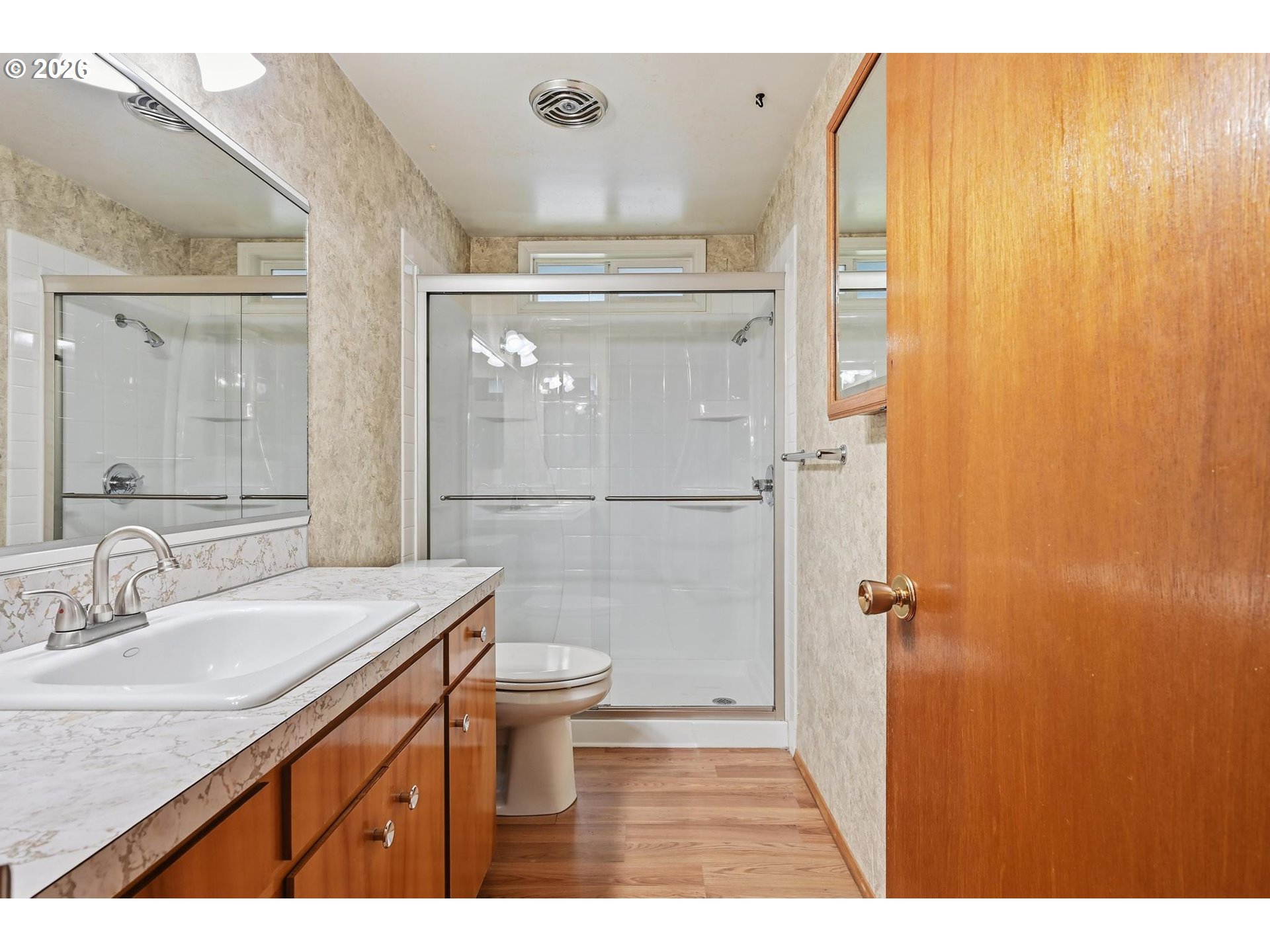 1720 Jansen Way Woodburn, OR 97071 - Photo 19 of 41 a bathroom with a sink a toilet a shower and a mirror