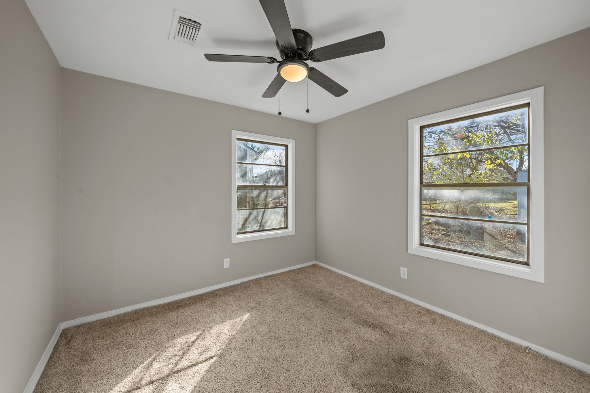 4110 Friar Point Road Houston, TX 77047 - Photo 12 of 15 a view of an empty room with a window