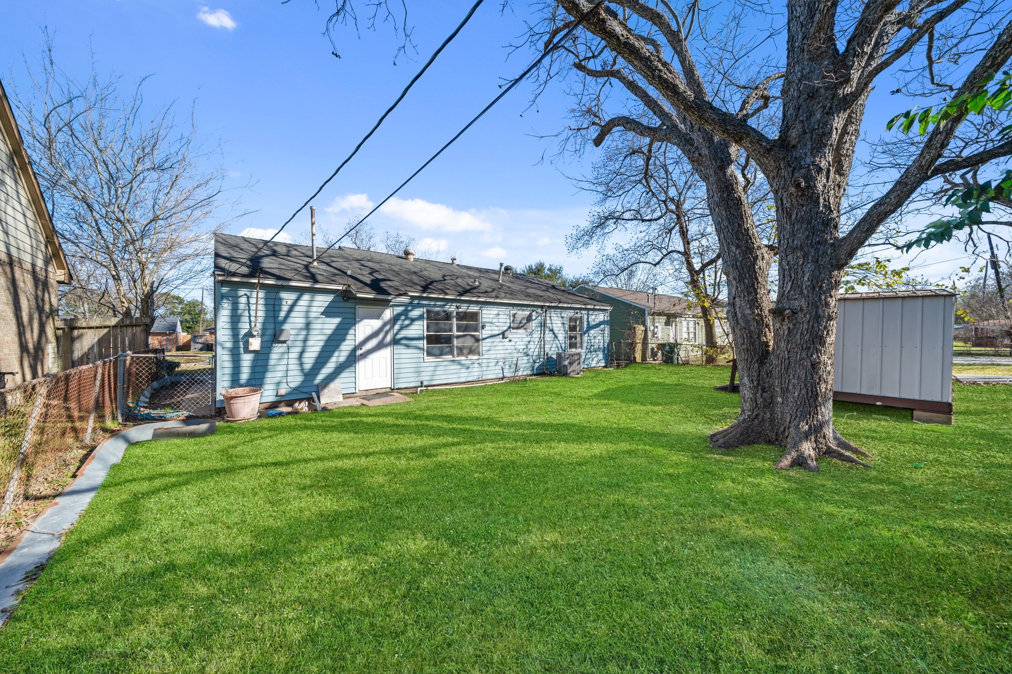 4110 Friar Point Road Houston, TX 77047 - Photo 6 of 15 a view of a house with a yard