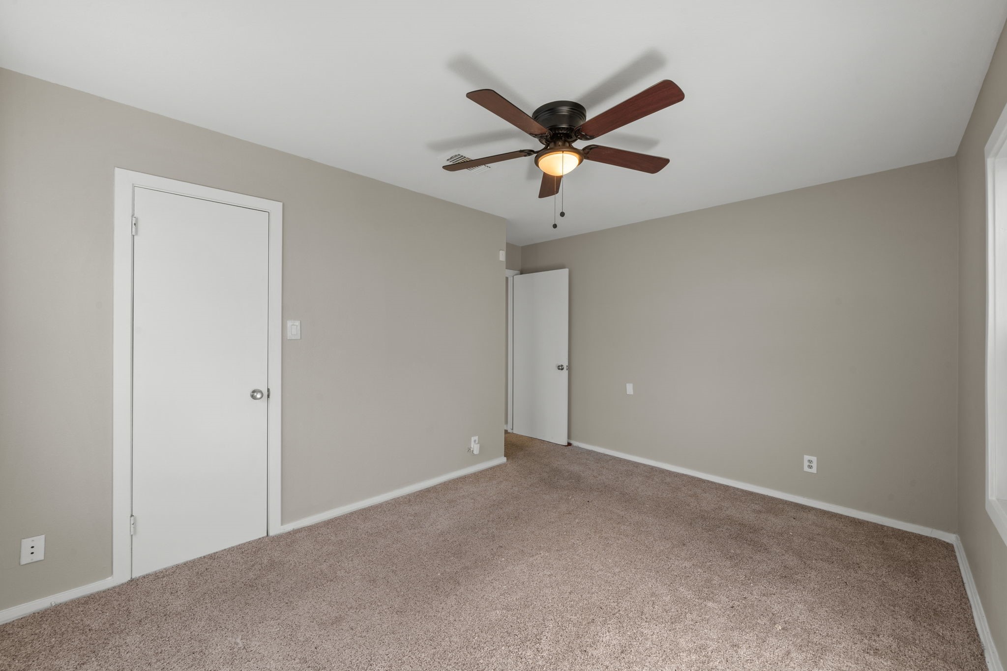 4110 Friar Point Road Houston, TX 77047 - Photo 10 of 15 a view of a big room with a ceiling fan