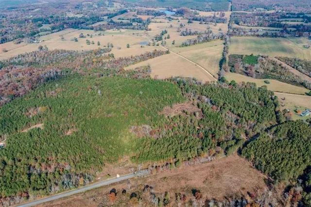 a view of a garden with a building