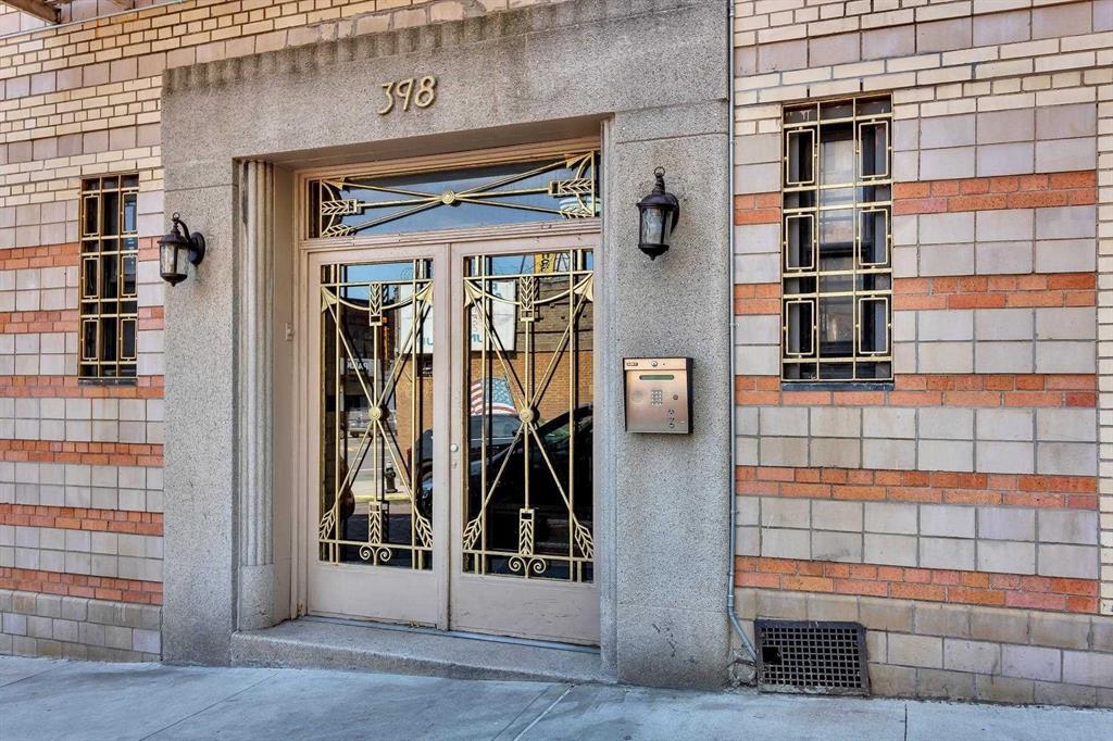 Property entrance featuring french doors