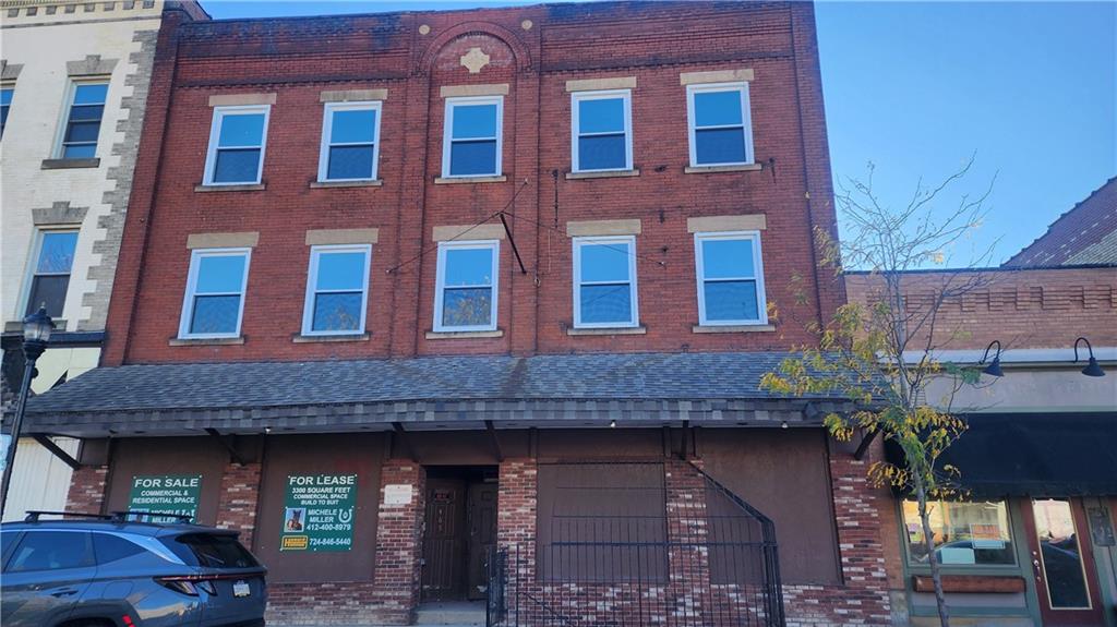 465 Merchant Street Ambridge, PA 15003 - Photo 1 of 3 a front view of a building