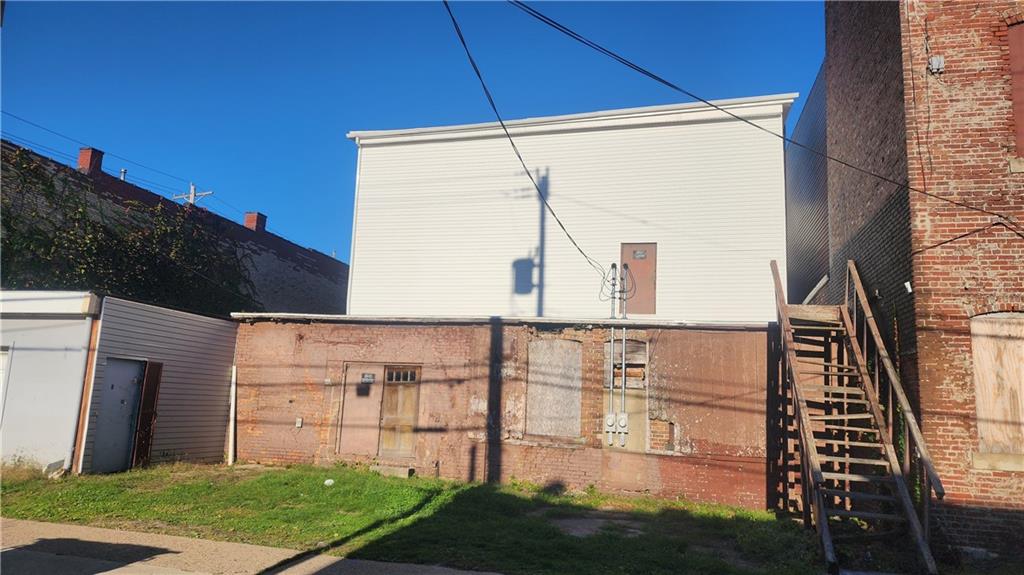465 Merchant Street Ambridge, PA 15003 - Photo 3 of 3 a view of a back yard of the house