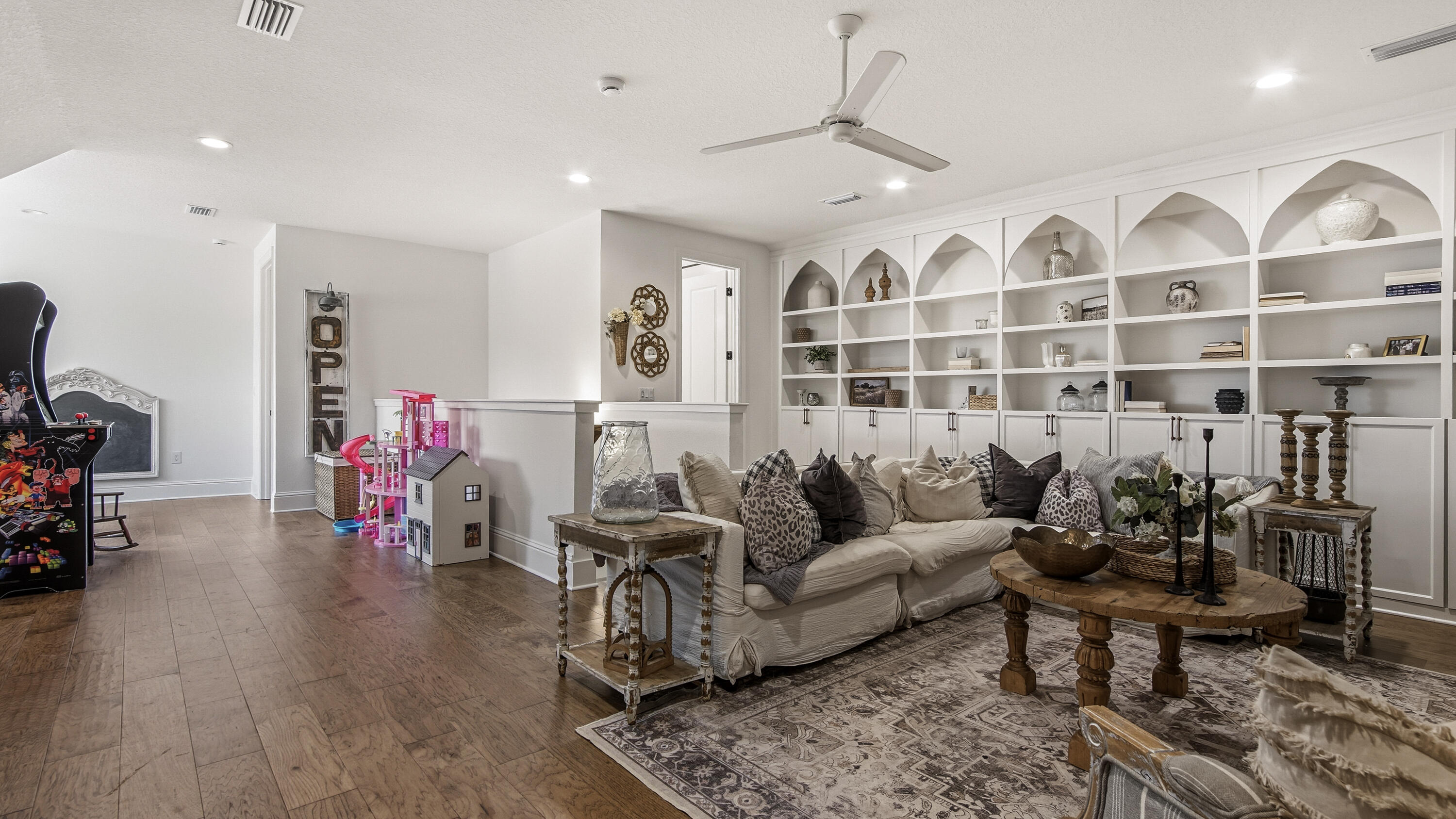 33 Caymus Cove Freeport, FL 32439 - Photo 48 of 144 a living room with furniture and a wooden floor