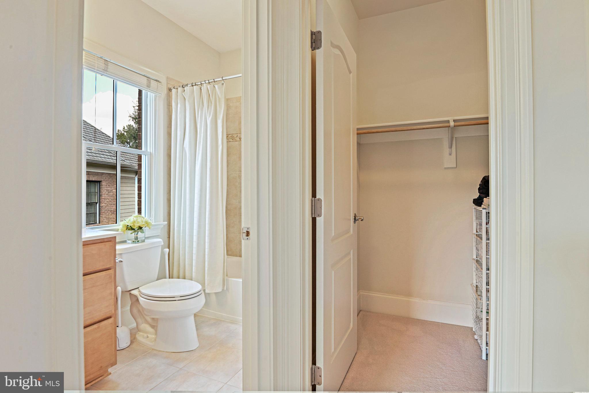 8424 Falcone Pointe Way Vienna, VA 22182 - Photo 27 of 71 a bathroom with a shower toilet and sink