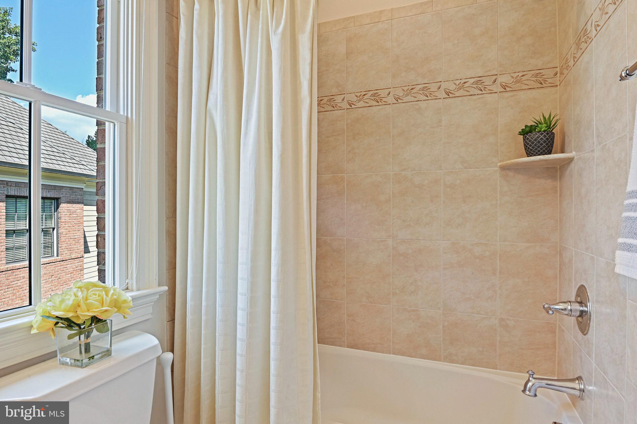 8424 Falcone Pointe Way Vienna, VA 22182 - Photo 29 of 71 a bathroom with a shower