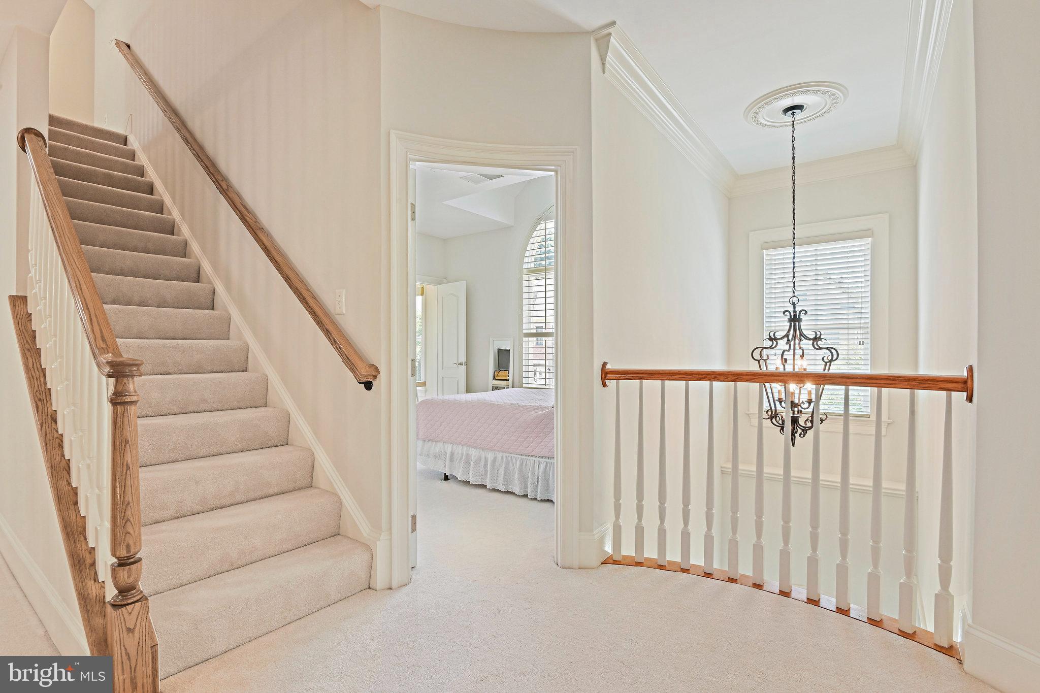 8424 Falcone Pointe Way Vienna, VA 22182 - Photo 30 of 71 a view of a hallway with windows