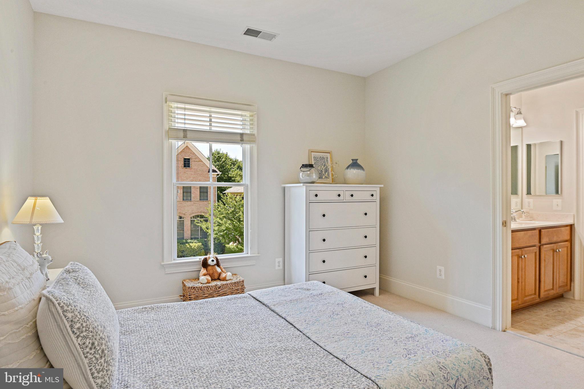 8424 Falcone Pointe Way Vienna, VA 22182 - Photo 38 of 71 a bedroom with furniture and windows