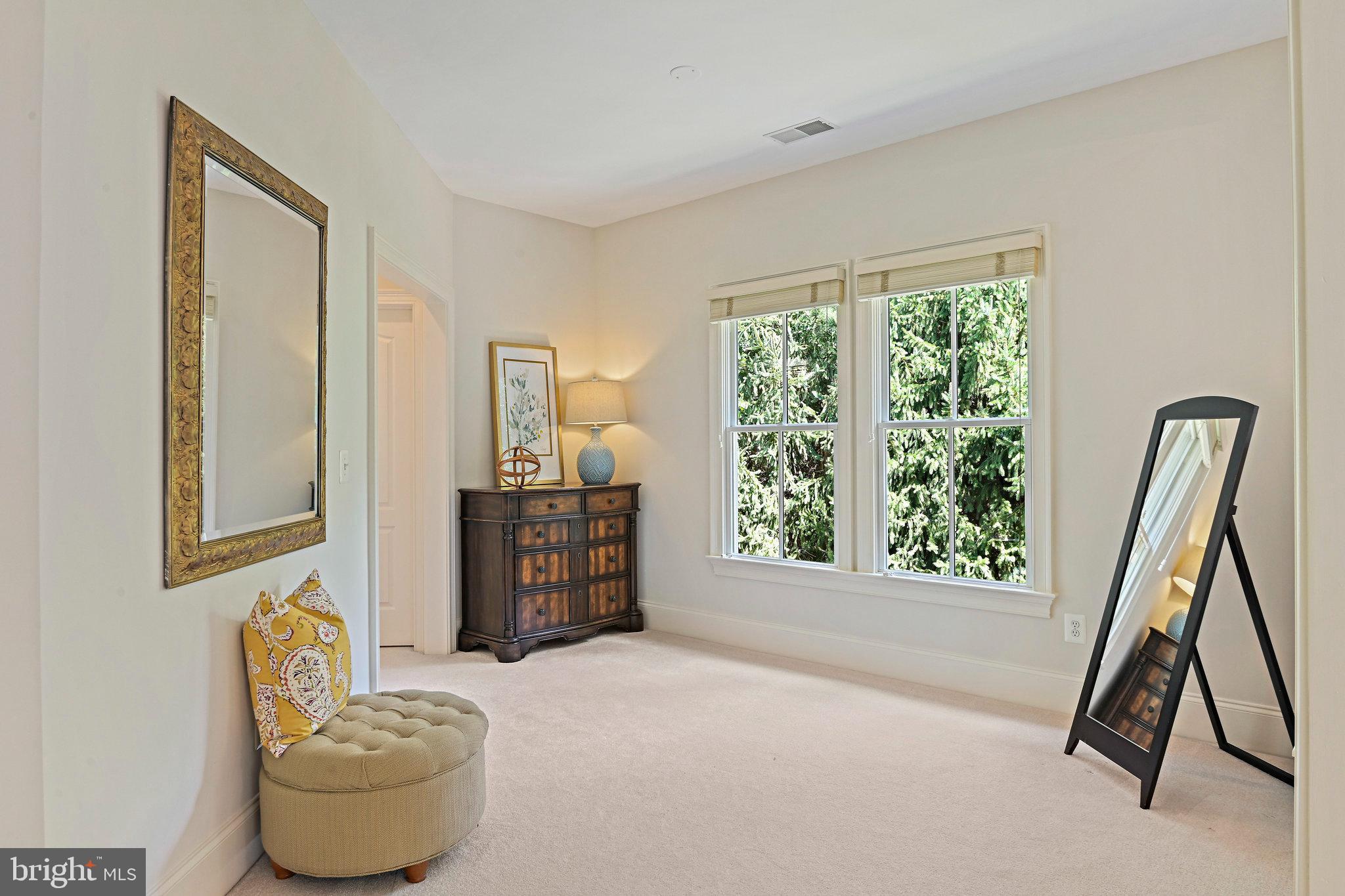 8424 Falcone Pointe Way Vienna, VA 22182 - Photo 44 of 71 a bedroom with a bed and a window