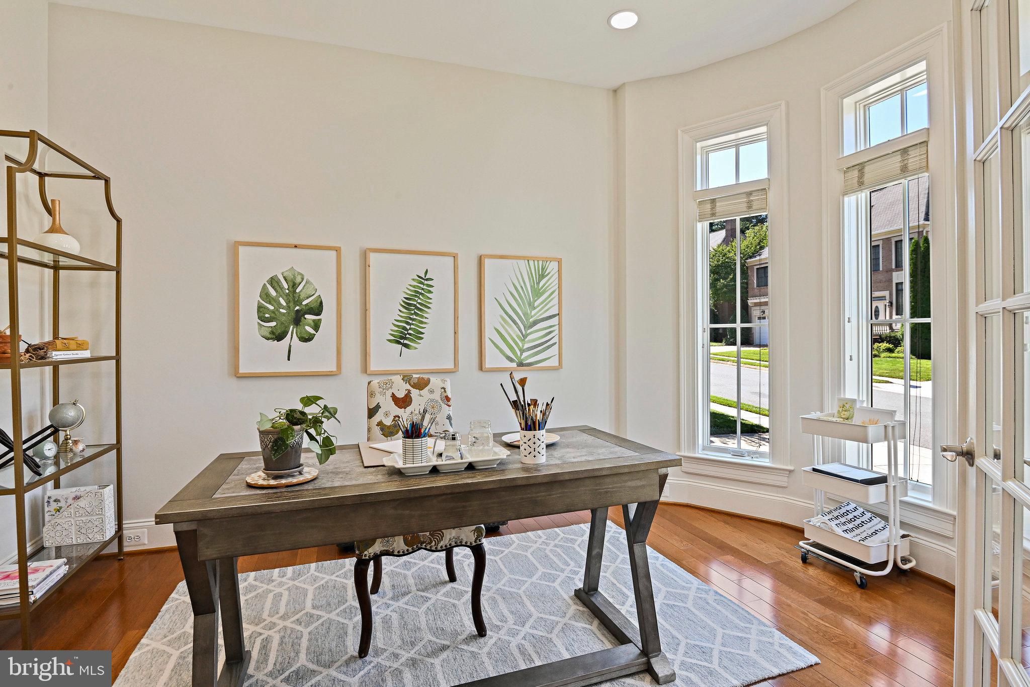 8424 Falcone Pointe Way Vienna, VA 22182 - Photo 5 of 71 a view of a dining room with furniture window and wooden floor