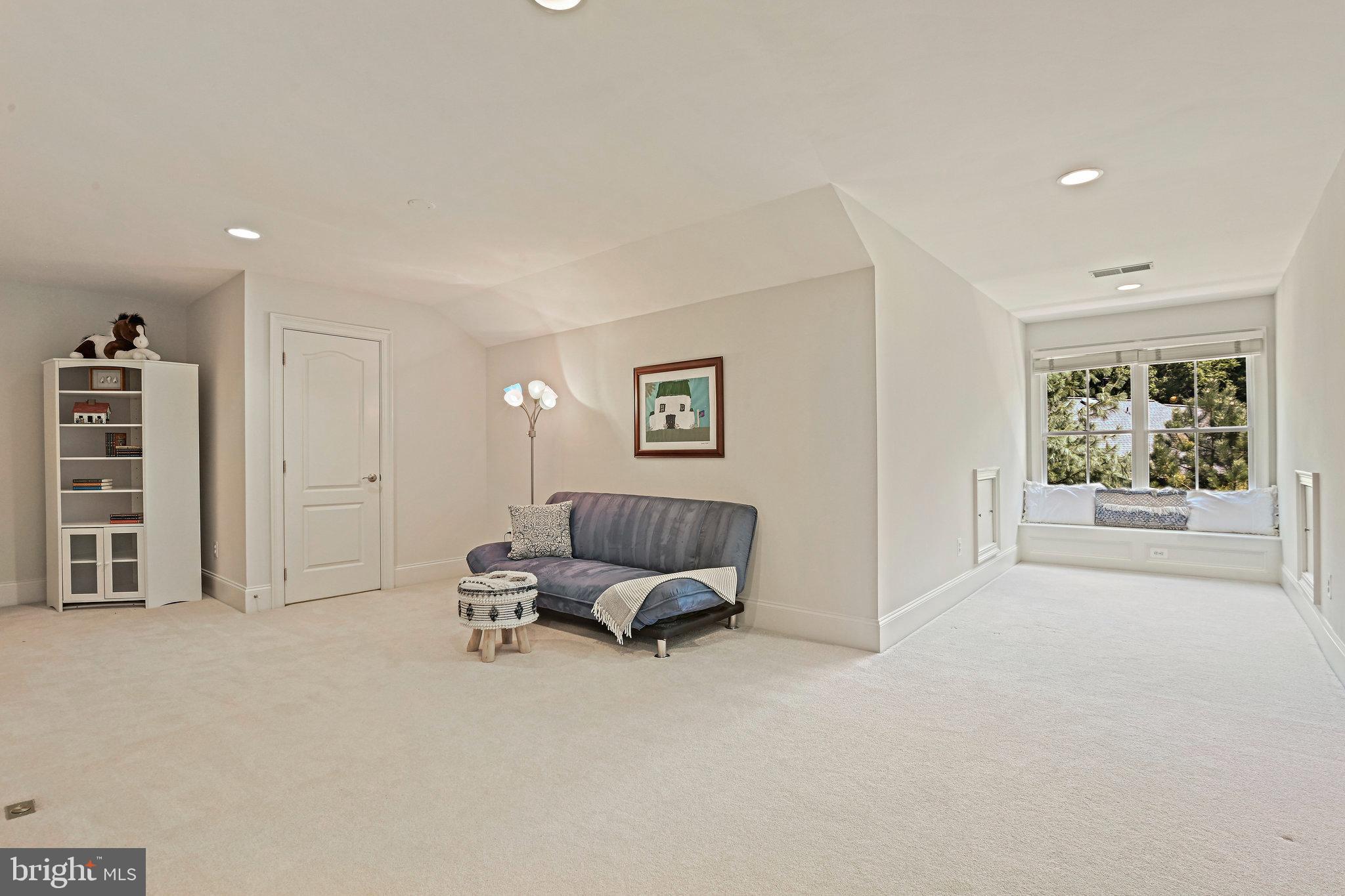8424 Falcone Pointe Way Vienna, VA 22182 - Photo 52 of 71 a view of a livingroom with furniture and a couch