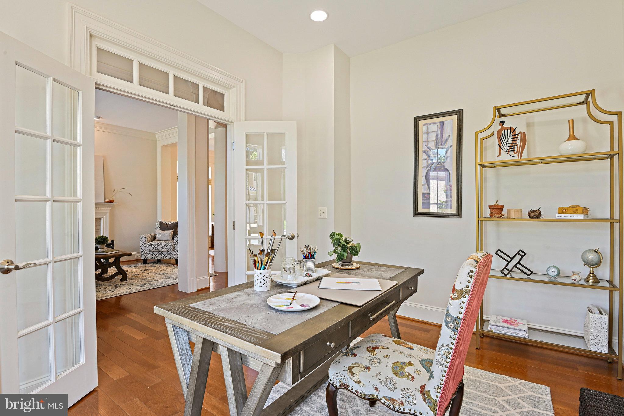 8424 Falcone Pointe Way Vienna, VA 22182 - Photo 6 of 71 a view of a a dining room with furniture window and wooden floor
