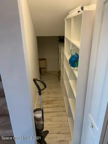 an outdoor space with swimming pool and furniture