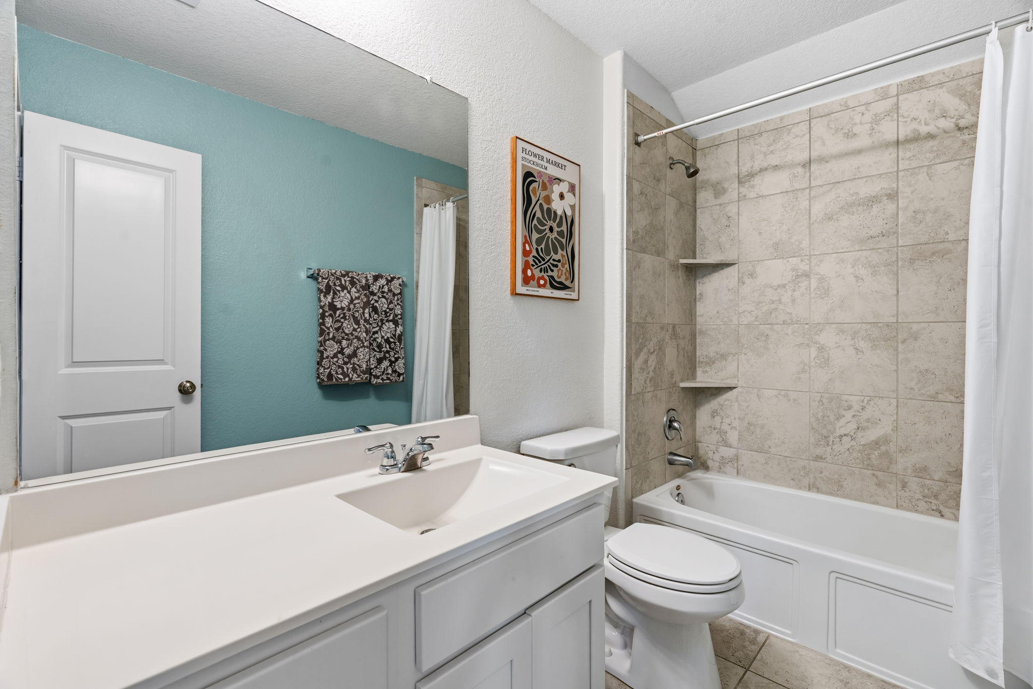 3101 Fresh Spring Road Pflugerville, TX 78660 - Photo 27 of 39 This hall bath has an extended vanity and services bedrooms 3 & 4 along with the upstairs living area.