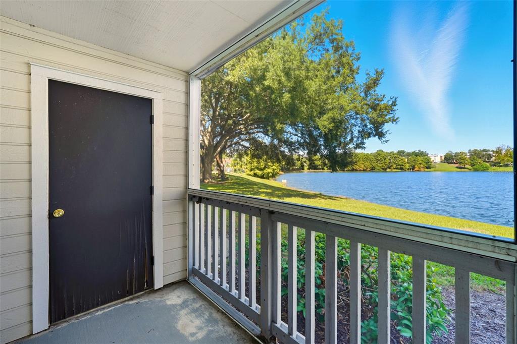 1039 South Hiawassee Road, Unit 2918 Orlando, FL 32835 - Photo 24 of 28 a view of a balcony with lake view