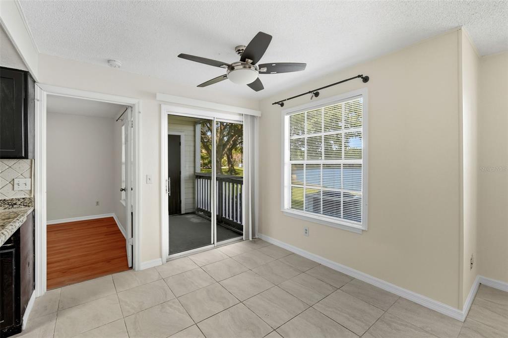 1039 South Hiawassee Road, Unit 2918 Orlando, FL 32835 - Photo 8 of 28 a view of an empty room with a window