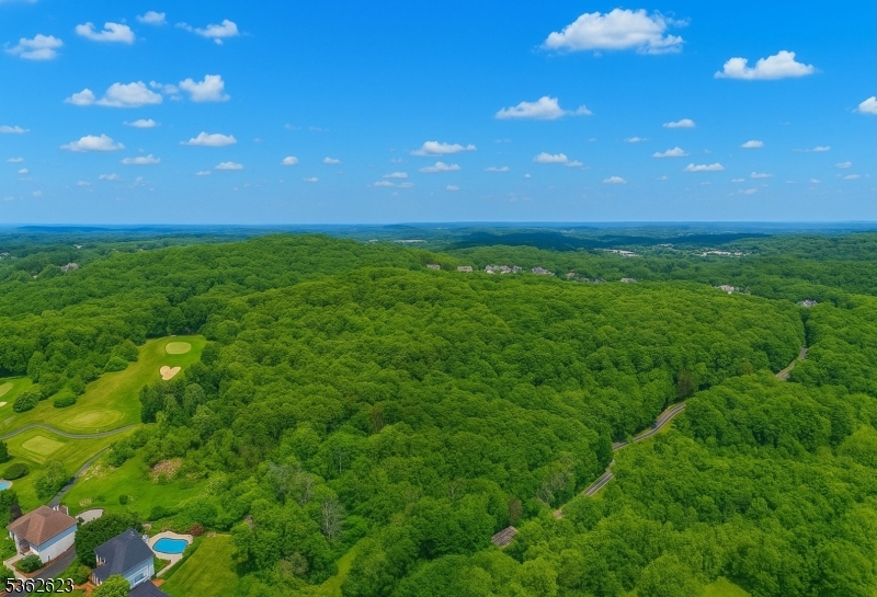 86 Lafayette Road Sparta, NJ 07871 - Photo 3 of 18 a view of an ocean and a yard