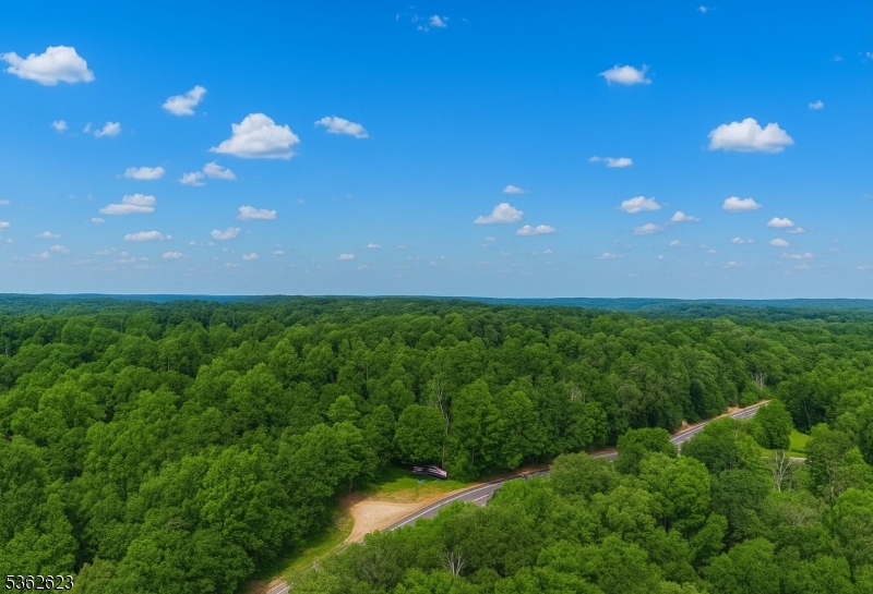 86 Lafayette Road Sparta, NJ 07871 - Photo 4 of 18 a view of an ocean and a yard
