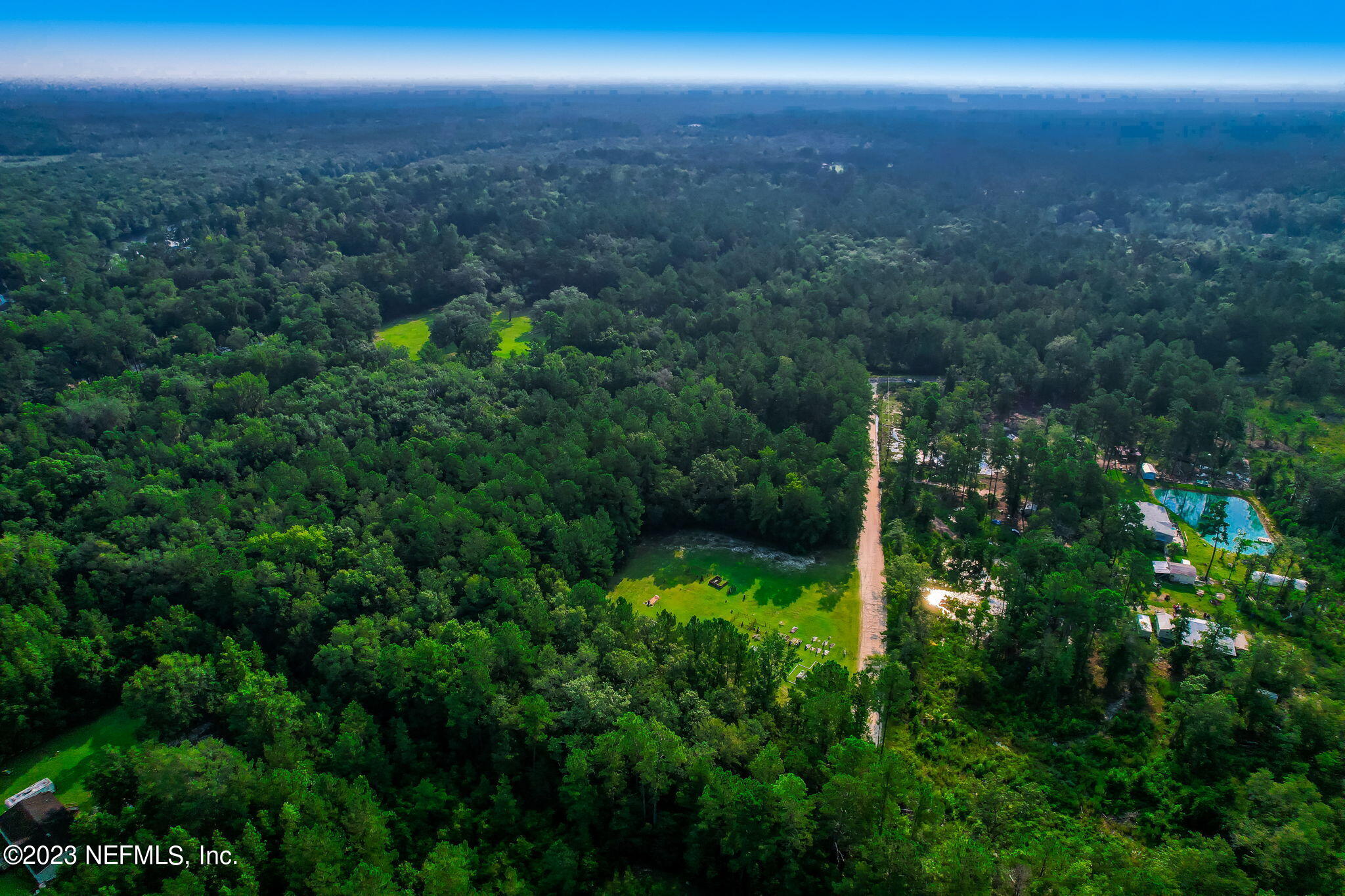 0 Middle Road Hilliard, FL 32046 - Photo 9 of 19 a view of a lush green forest