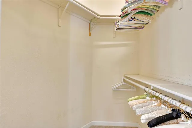 a bathroom with a shower and a sink