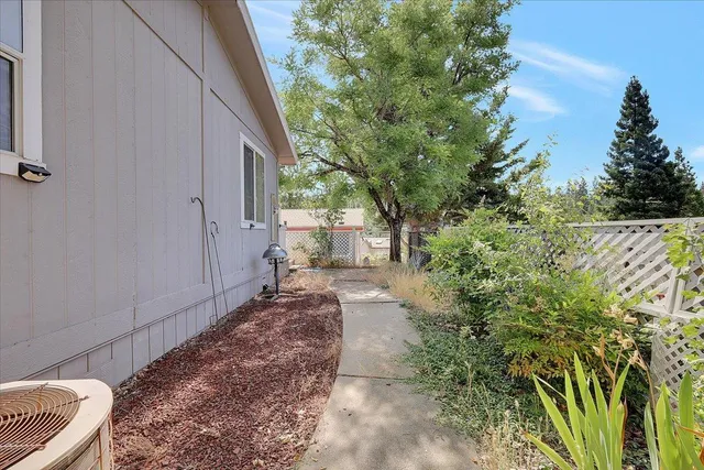an entrance to house with yard