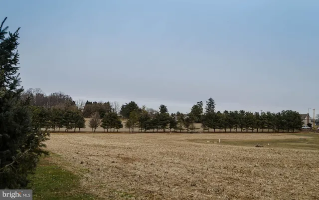 a view of lake view and mountain in background