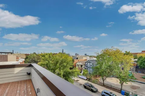 a white toilet sitting next to a bathroom sink