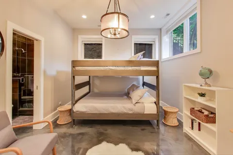 a view of backyard with a garden and trees