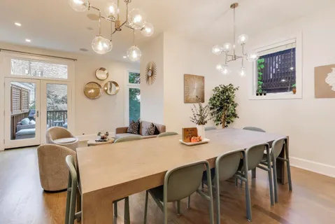 a kitchen with a refrigerator and cabinets