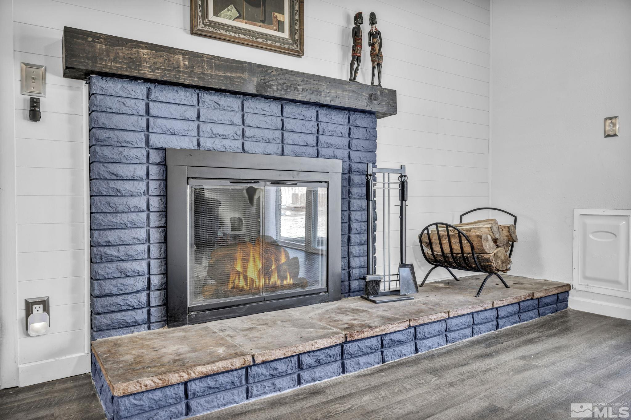 12060 Broken Hill Road Reno, NV 89511 - Photo 10 of 21 a living room with furniture and a fireplace
