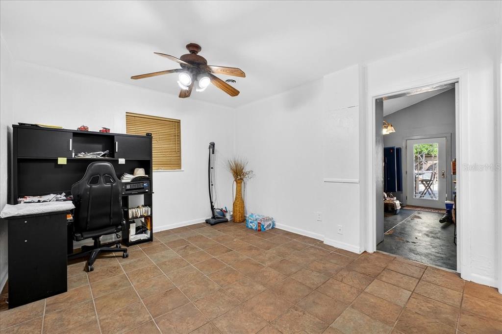 1501 North Combee Road Lakeland, FL 33801 - Photo 16 of 34 a view of a workspace with furniture and a window