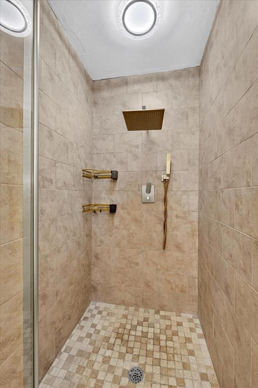 1501 North Combee Road Lakeland, FL 33801 - Photo 19 of 34 a bathroom with a shower